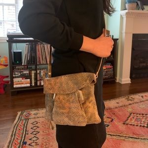 Snakeskin multi pocket crossbody travel bag